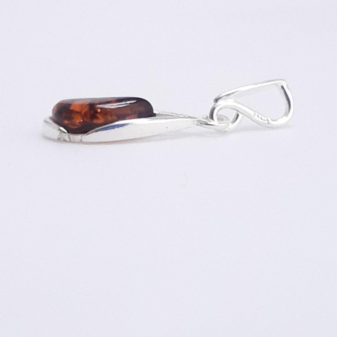 DIJE SEMI CIRCULAR Y PLATA